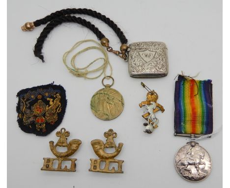 A lot comprising a WWI group of two to 52297 Pte. D Dunwoodie H.L.I., a silver vesta, hair Albert patch etc Condition Report: