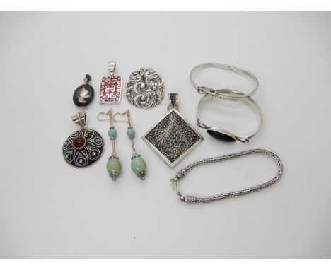 An Italian silver and enamel pendant by Milor, silver bangles pendants etc Condition Report: Not available for this lot