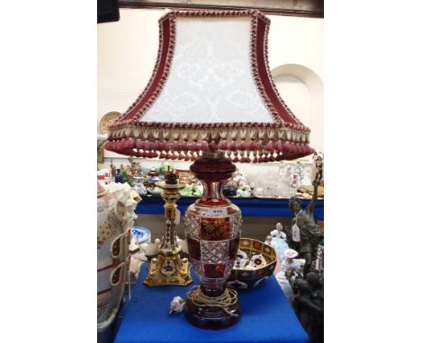 A Bohemian ruby flashed and cut table lamp Condition Report: Available upon request