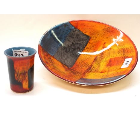 A Poole Pottery orange and red glazed bowl and a similar beaker Condition Report: Available upon request