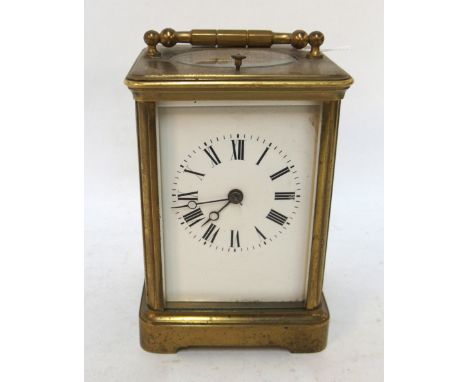 A French brass and glass carriage clock marked 15507 to base Condition Report: No sign of life, but no damage .