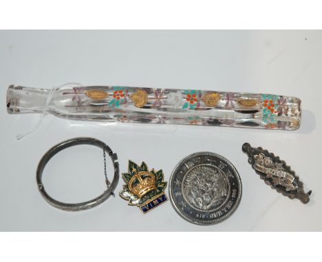 A child's silver bangle, Japanese coin converted to brooch, scent bottle etc Condition Report: Available upon request