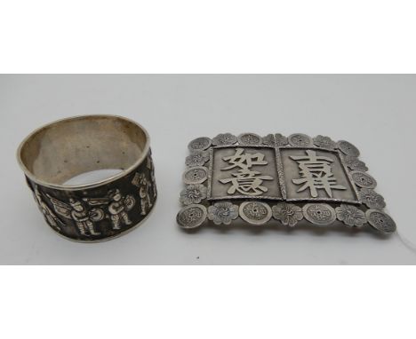 A lot comprising a Chinese export silver buckle by Wang Hing, rectangular, decorated with Chinese characters, 8.8cm x 6cm wit