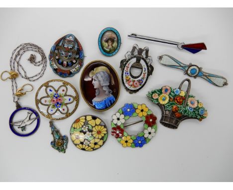 A collection of enamelled jewellery to include a silver Art Deco flower brooch by A. H Darby &amp; Son, a portrait of a lady 