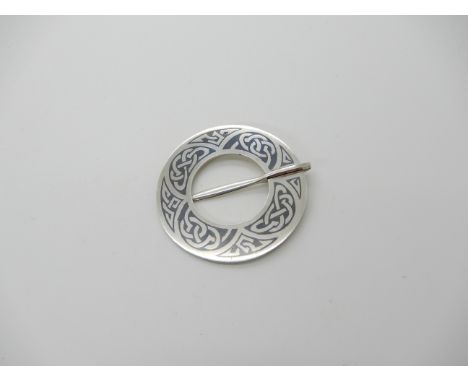 A white metal Niello Celtic knotwork annular style brooch Condition Report: Not available for this lot