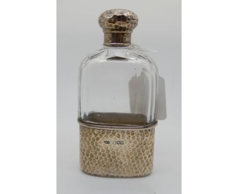 A silver topped and mounted glass spirit flask by Wolfsky &amp; Company, London 1902, 13.5cm high Condition Report: Available