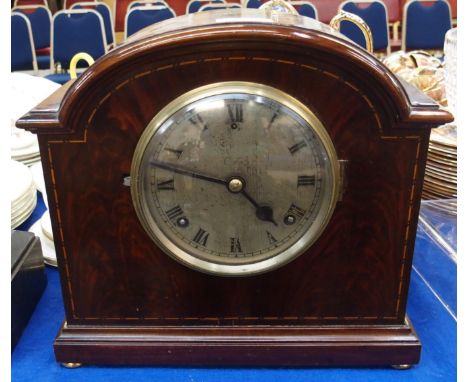 A mahogany dome topped mantle clock with American movement Condition Report: Available upon request