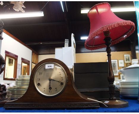 A dome topped mantle clock together with a turned wooden table lamp Condition Report: Available upon request