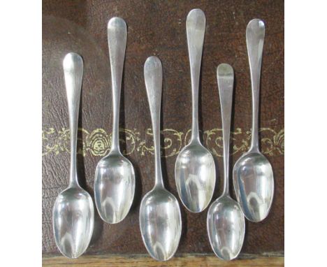 Six mid 18th century silver teaspoons, five being picture back