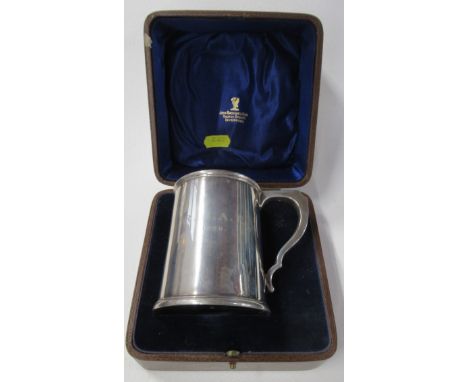 A cased silver mug, with engraving, weight 6oz