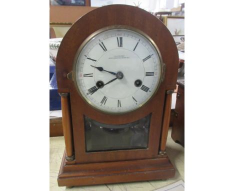 A mahogany cased mantel clock