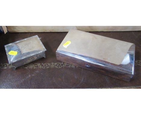 A silver jewellery box, together with another box