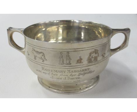 A silver two handled bowl, engraved with Noah's ark, animals, figures and an inscription, weight 7oz