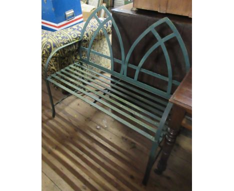 A green metal garden bench, width 39.5ins, depth 16ins, height 39ins
