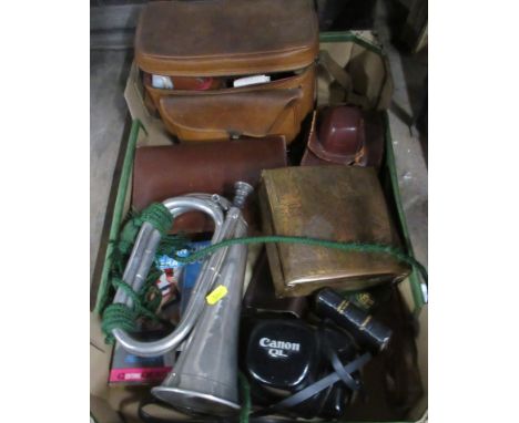 A collection of items, to include a bugle, cameras etc
