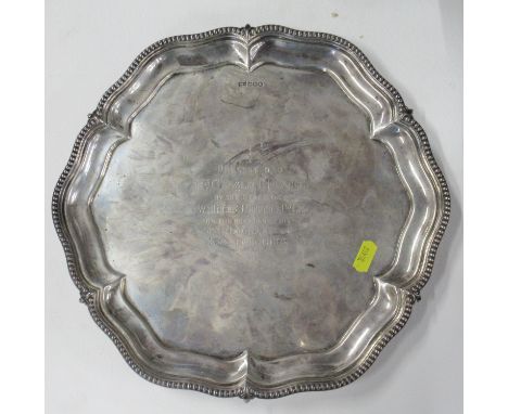 A silver salver, with presentation inscription, weight 33oz