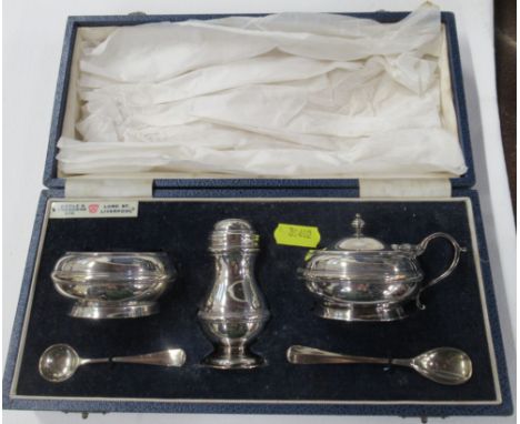 A cased silver cruet set
