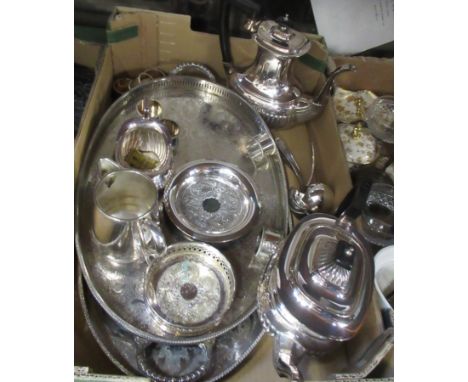 A box of assorted silver plated items
