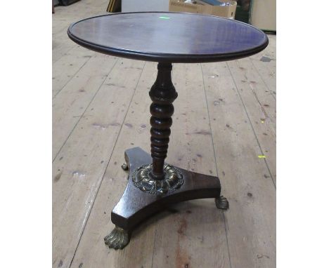 A small circular occasional table, with bobbin turned column, to triform base with gilt metal mount and feet, height 17.5ins,