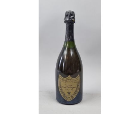 Dom Perignon 1982 Vintage Champagne   (Please note fill level and slightly "grimey" bottle)  