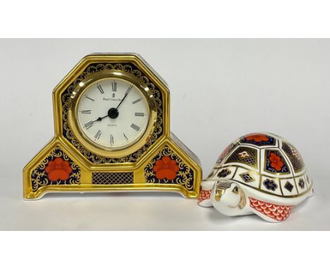 A Royal Crown Derby 1128 Imari pattern mantel clock, 10cm high, second quality; an 1128 pattern paperweight, Turtle, moulded 