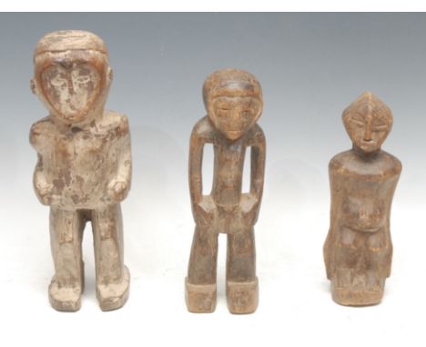 Tribal Art - a Mbete figure, stylised concave heart shaped features, traces of kaolin decoration, 29cm high, Gabon/Democratic