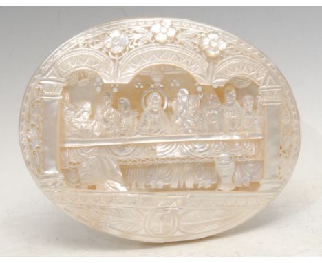 A mid-century Jerusalem mother-of-pearl shell, carved with The Last Supper, after the Old Masters, easel verso, 14cm high, 18