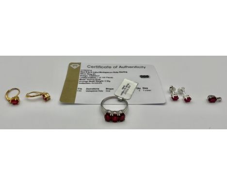 A Selection of Silver Ruby Jewellery; to include a 1.00ct (1 carat) African Ruby oval brilliant cut solitaire pendant in plat
