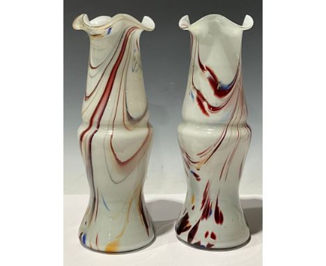 A pair of Murano style frilled glass vases, decorated in tones of blue red and orange on a white ground, 33cm high (2)