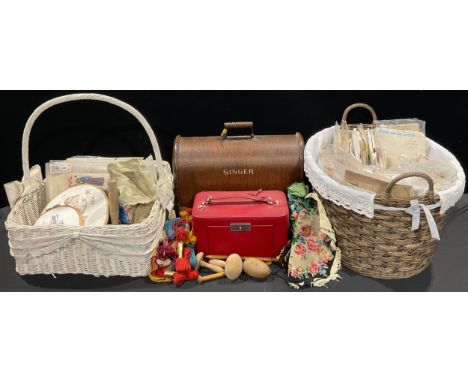A quantity of dress making patterns, including Vogue, etc; other needlework accessories; a leather jewellery box; a Singer ha
