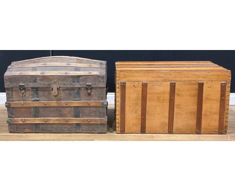 An early 20th century wood and metal bound dome top steamer trunk, 58cm high, 77.5cm wide, 47cm deep; another chest or trunk 