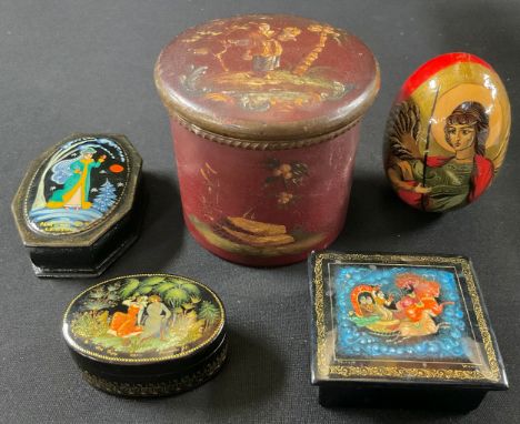 An oriental 19th century painted tobacco box, decorated with fruit picking scenes, 8.5cm high; a Russian Orthodox decorative 