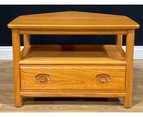 An Ercol drop-leaf corner unit, rectangular top with triangular fall leaf above a long drawer, 47.5cm high, 71.5cm wide, 47cm