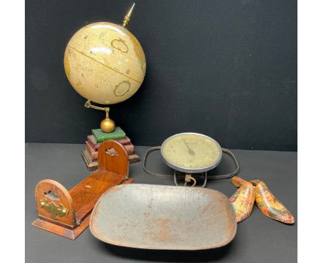 A brass mounted folding book rack, Legends city populations terrestrial globe, set of Salters 18T trade spring balance grocer