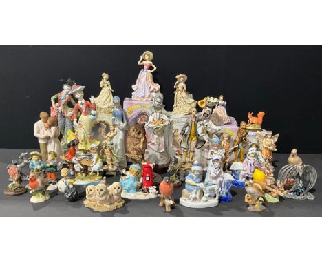 An Italian Stelio Mola pottery figure, of a fruit seller; another, as a water carrier; Leonardo Collection figures, including