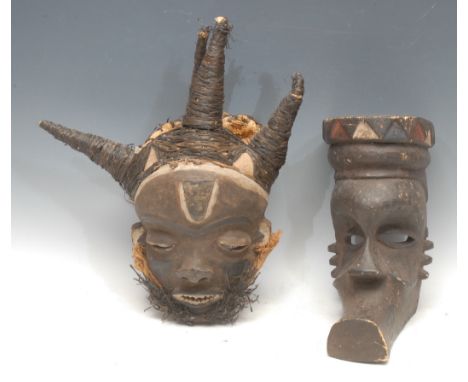 Tribal Art - a Pende Mbuya mask, bound and adorned in fibrous twine, 38cm high, Zaire; another (2)
