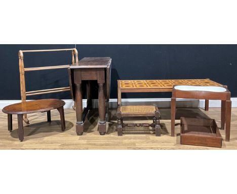 A 1970s tile-top coffee table, 40.5cm high, 114cm long, 53cm deep; a gateleg table; a bidet; a low oval occasional table, rep