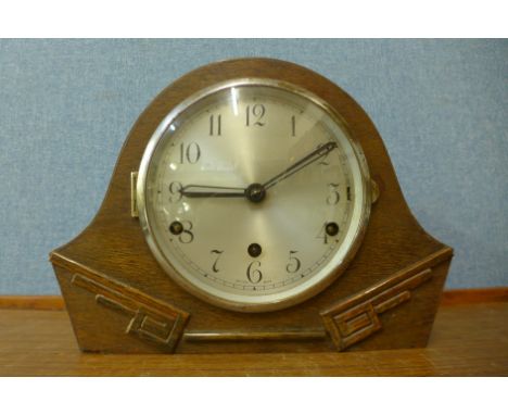 An Art Deco oak mantel clock 