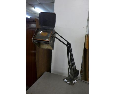 An industrial metal anglepoise work lamp 