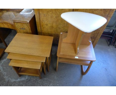 A teak nest of tables, occasional table and a stool 