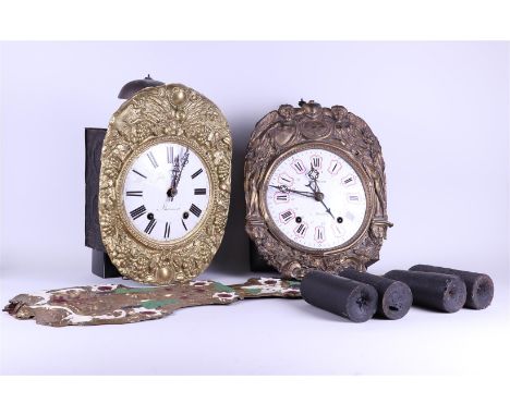 A lot consisting of (2) comptoise clocks. The first addressed: David Magot / à Beaumont, the second Jules Aziron / à Beaumont