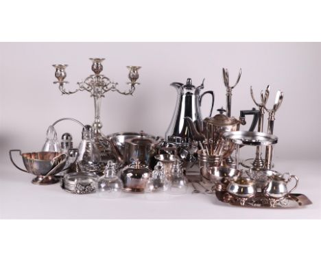 A lot of various (silver plated) objects including a candlestick and a tea set.