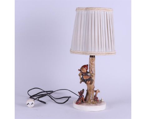 MI. Hummel, a large table lamp, marked: "Goebel".H. 44 cm.