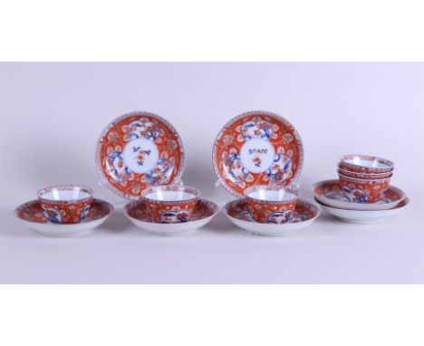 A set of (5) porcelain Imari cups and saucers with landscape decor in compartments. Japan, 18th century.