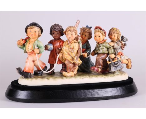  A rare piece of Goebel M.I. Hummel - 2000 "Worldwide Wanderers", Limited edition no. 826 of 2000.21 x 38 cm.