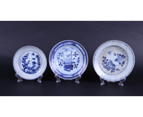 A lot of three porcelain plates including Kangxi. China, 18th century.