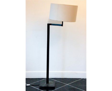 An adjustable wrought iron floor lamp with white shade. Dimmable.H.: 161 cm.