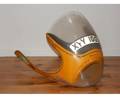 A vintage motorcycle fairing, Read Titan, yellow fibreglass with integral headlamp perspex and screen L. 84cm