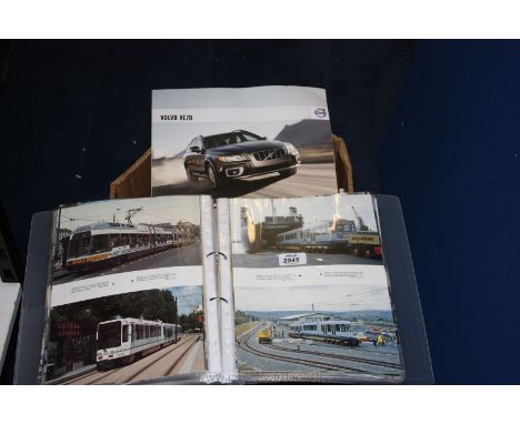 A box of binders of Steam Engine, train and movie advertising