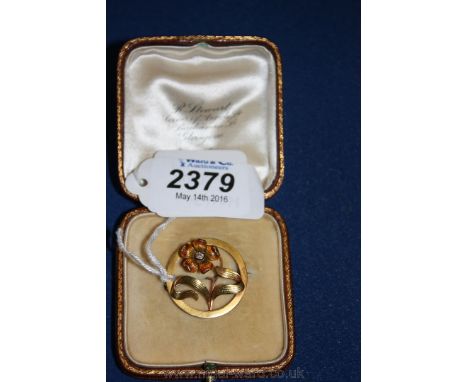 An 18ct Gold hand crafted Art Nouveau style Brooch having an enamel flower set with a single Diamond centre.